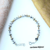 Bracelet moderne et original en hématite plaquage doré et argenté 