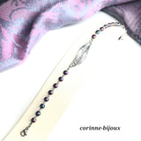 Bracelet moderne et original en perles d'hématite couleur arc-en-ciel. Fermoir en acier inoxydable.