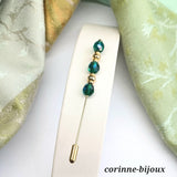 Epingle a chapeau avec perles en verre facetées couleur vert foncé. Modèle unique fait main par Corinne Lannel à Beynes.