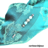 Epingle à chapeau en pierre larimar et oeil de chat