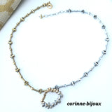 Collier fait main. Couleur argenté et doré.