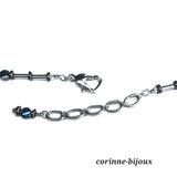 Collier en tissu d'aluminium et hématite argenté et arc en ciel. Couleur neutre. Fermoir acier inoxydable. Collier fait main à Beynes dans les Yvelines.