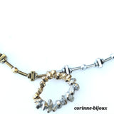 Collier unique fait main composé de perles en hématite plaquage doré et argenté.