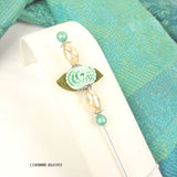 Broche épingle à chapeau fleur tissu bleu vert et blanc