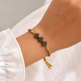 bracelet élégant doré avec cordon jaune et ajustable à tous les poignets