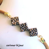 bracelet composé de perles dentelées jaune doré vintage