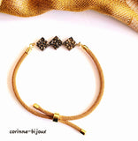 bracelet aux couleurs jaune doré vintage