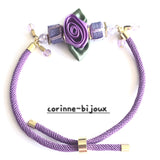 bracelet cordon tressé violet et finitions dorées