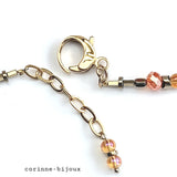 Collier fleur en satin orange et doré