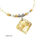 Collier en verre jaune